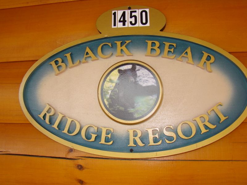 Sign on the front of a cabin in Black Bear Ridge denoting the address of the property located in Pigeon Forge TN