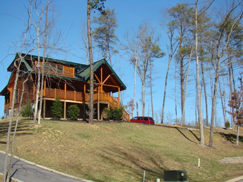 Cabin on Mountain Lodge Way in Covered Bridge Resort. Pigeon Forge cabin development in the Smoky Mountains. The community offers a community pool and quality overnight rental cabins