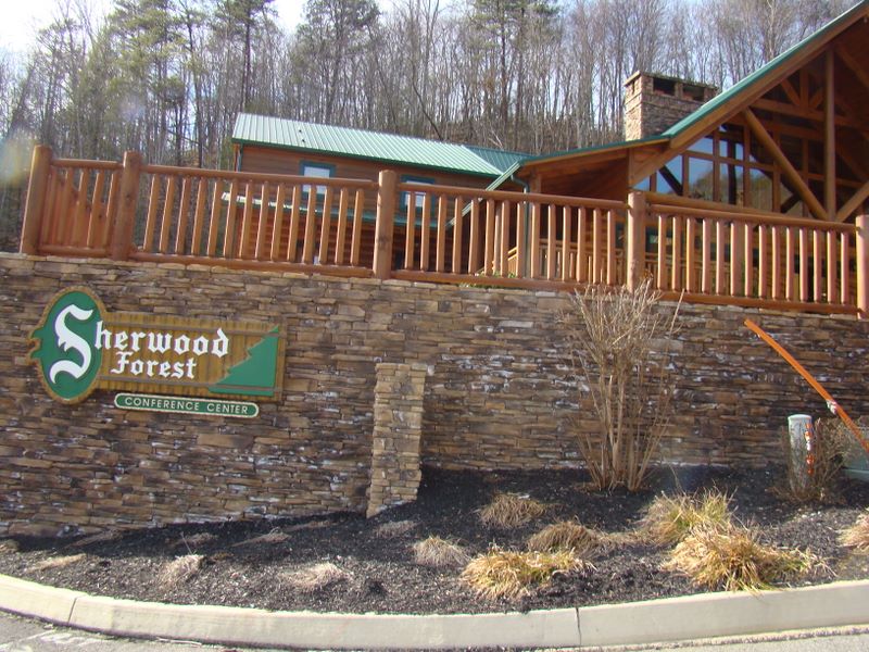 Sherwood Forest stone sign in front of the conference center lodge (clubhouse) - Pigeon Forge cabin rental development