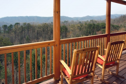 Pet Friendly cabin just minutes to Pigeon Forge with great mountain views! Located in the exclusive Sherwood Forest Resort with a community pool! The cabin sleeps 8 with flat screen TV's and high end decorations and furnishings!
