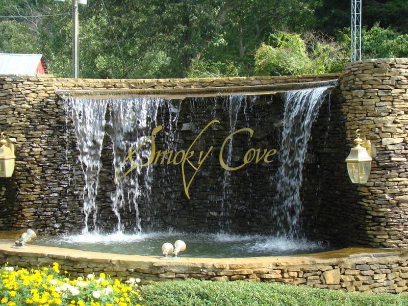 Smoky Cove - Log Cabin Resort in the Smoky Mountains Near Pigeon Forge, TN. Located off Bluff Mountain Road. Features a community swimming pool, horseshoe pit, and much more